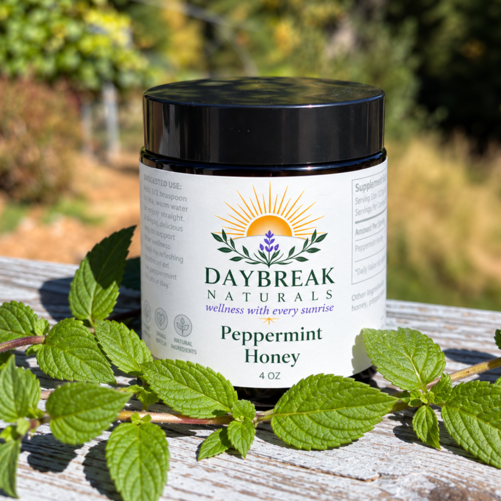 Jar of Peppermint Honey with mint leaves