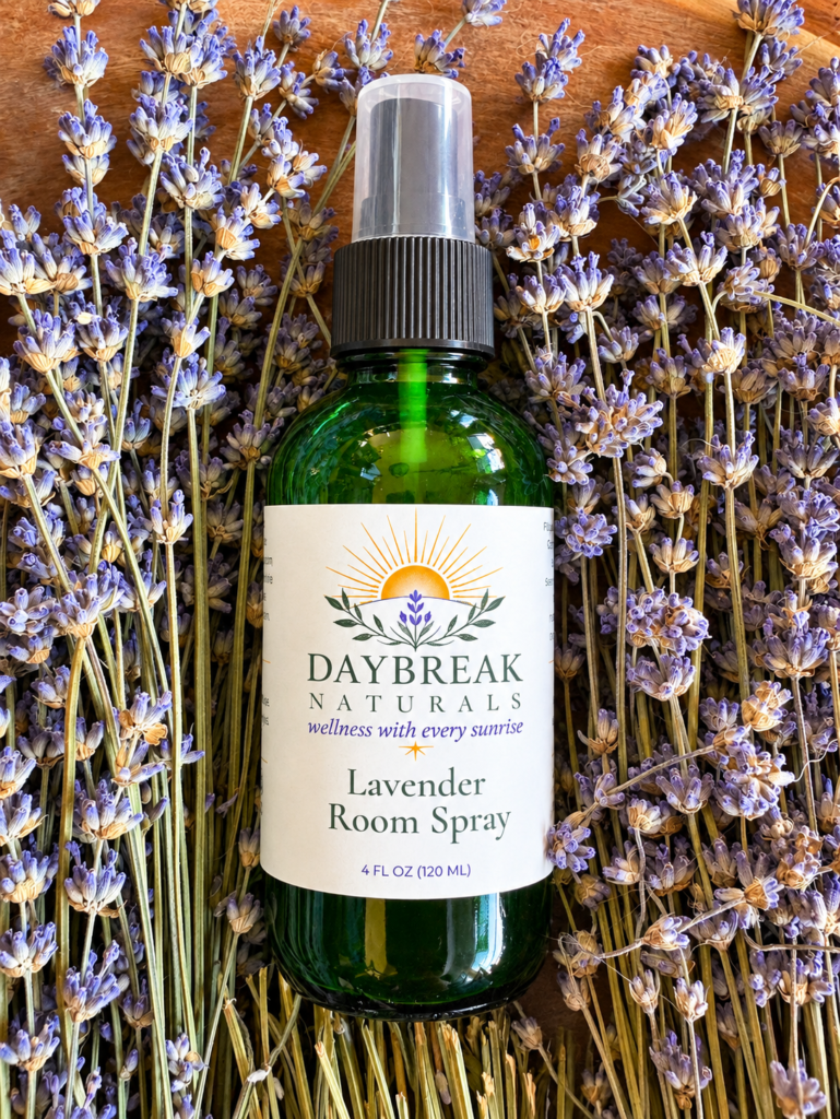 bottle of lavender room spray with lavender flowers